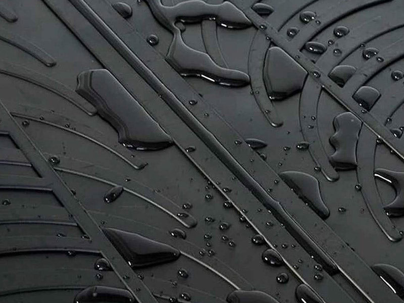 Waterproof floor mat with water on surface